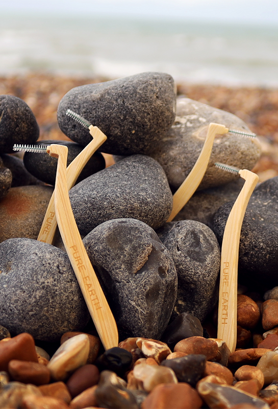 L-shaped interdental brush on rocks