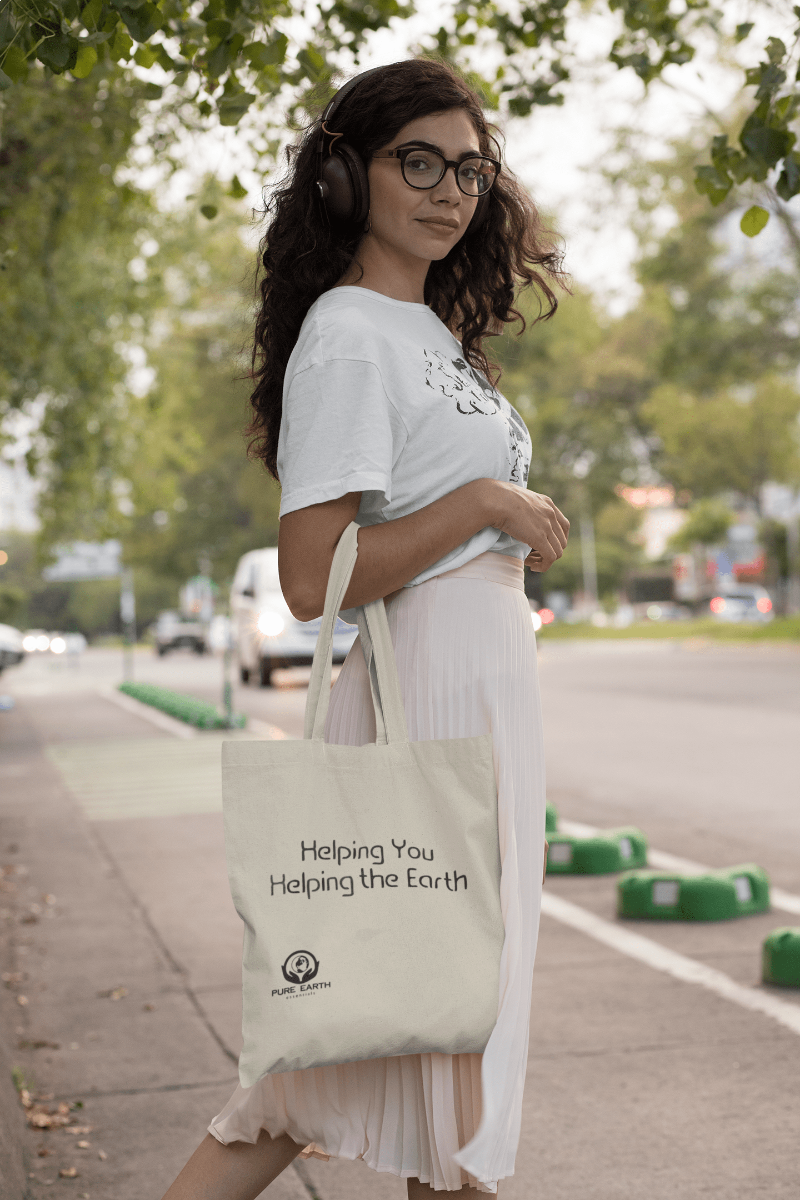 Model wearing Pure Earth Essentials tote bag